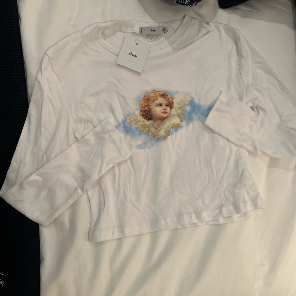 Adika white long sleeve angel top